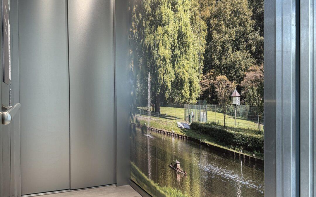 RVS folie en full-colourprint lift Gemeente Almelo